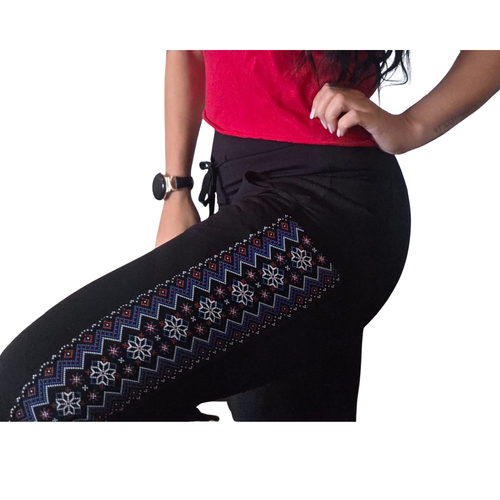 Black pants with intricate pattern on a white background